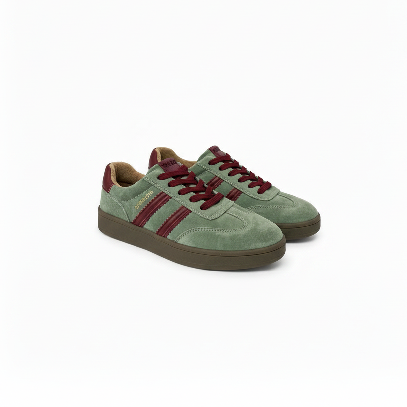 A pair of green suede sneakers with burgundy laces, burgundy side stripes, and a brown sole, shown on a white background.