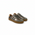 A pair of low-top sneakers with metallic bronze and dark gray panels, dark gray laces, and brown gum soles, shown on a white background.